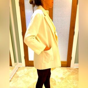 Beautiful and versatile cardigan sweater in cream by J Crew barely worn